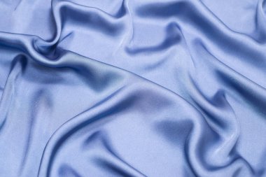 Mavi ipek ya da saten lüks kumaş. Üst görünüm.