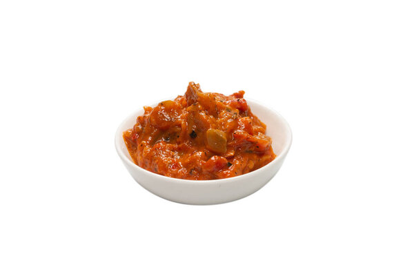 Vegetable stew in a bowl isolated on white background. 