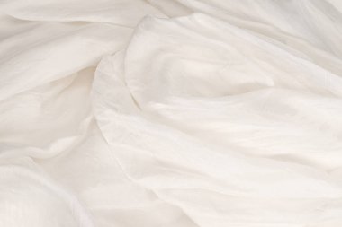 Yumuşak beyaz ipek kumaş arka plan. Kumaş dokusu. 