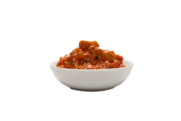 Vegetable stew in a bowl isolated on white background. 