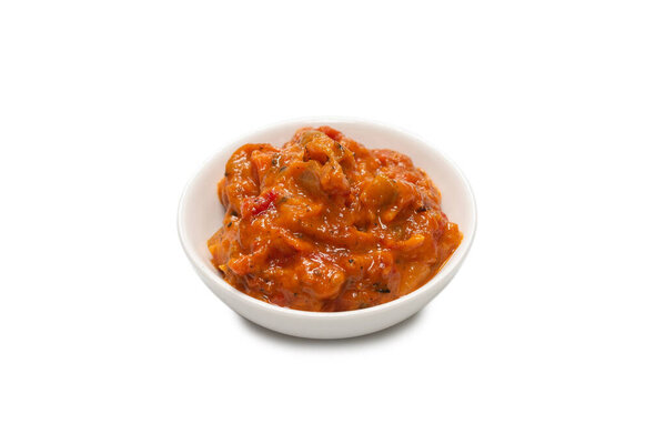 Vegetable stew in a bowl isolated on white background. 
