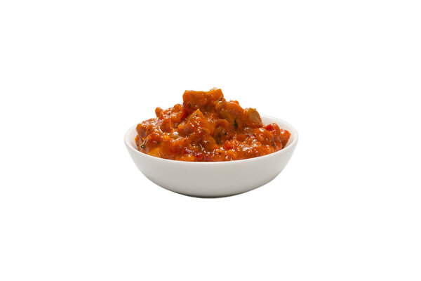 Vegetable stew in a bowl isolated on white background. 