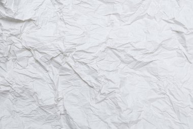 Buruşmuş beyaz kağıt arka plan. Üst görünüm. 