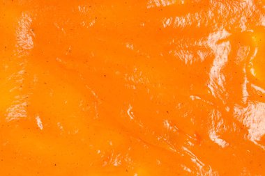 Arkaplan olarak portakal sosu sıçrar.