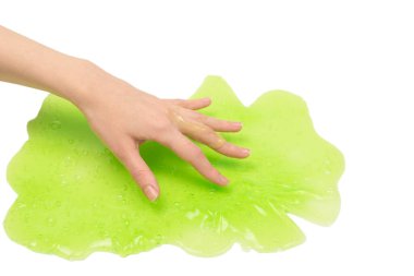 Beyaz arka planda yeşil sümüklü oyuncak..