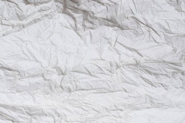 Buruşmuş beyaz kağıt arka plan. Üst görünüm. 