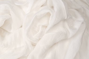 Yumuşak beyaz ipek kumaş arka plan. Kumaş dokusu. 