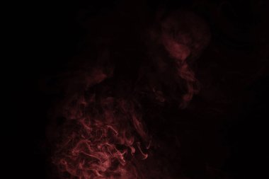 Siyah arka planda sarı ve pembe buhar. Boşluğu kopyala.