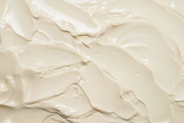 Beyaz krem şanti dokusu. Üst görünüm. 