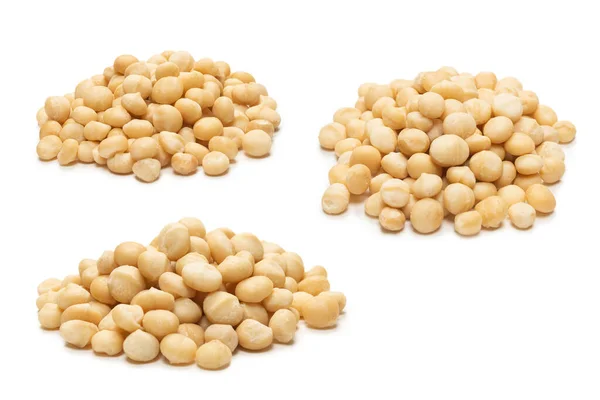 Macadamia Noten Geïsoleerd Witte Achtergrond Bovenaanzicht — Stockfoto