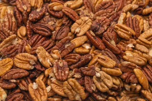 stock image Tasty pecan-nut background. Top view. 