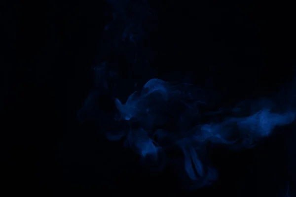 Blue And Yellow Steam On A Black Background Stock Photo - Download