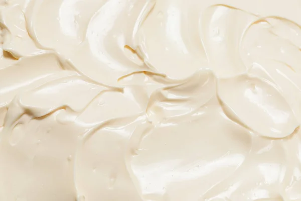 White whipped cream texture. Top view.