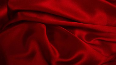Zengin ve lüks kırmızı ipek kumaş dokusu. Üst görünüm.