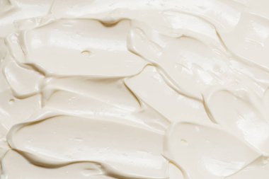 Beyaz krem şanti dokusu. Üst görünüm. 