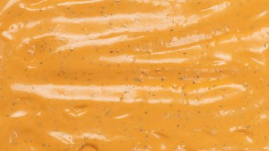 Çırpılmış leziz sos dokusu. Hamburger sosu geçmişi. Üst görünüm. 