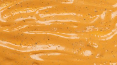 Çırpılmış leziz sos dokusu. Hamburger sosu geçmişi. Üst görünüm. 