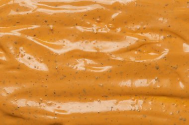 Çırpılmış leziz sos dokusu. Hamburger sosu geçmişi. Üst görünüm. 