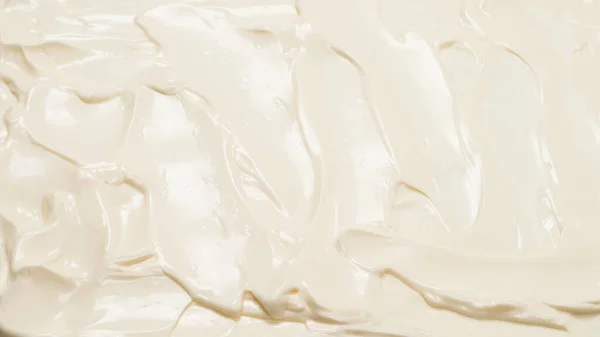 White whipped cream texture. Top view.