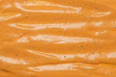 Çırpılmış leziz sos dokusu. Hamburger sosu geçmişi. Üst görünüm. 