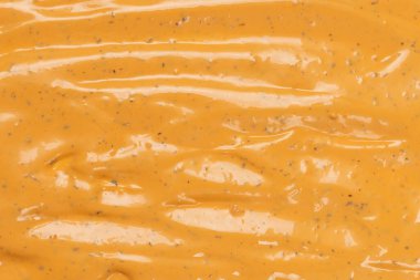 Çırpılmış leziz sos dokusu. Hamburger sosu geçmişi. Üst görünüm. 