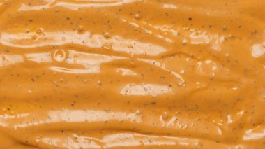 Çırpılmış leziz sos dokusu. Hamburger sosu geçmişi. Üst görünüm. 