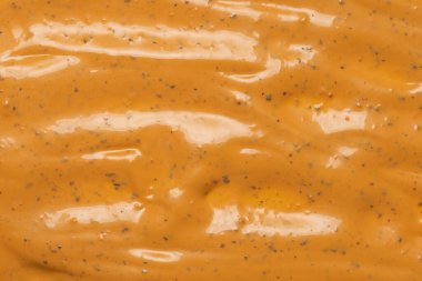 Çırpılmış leziz sos dokusu. Hamburger sosu geçmişi. Üst görünüm. 