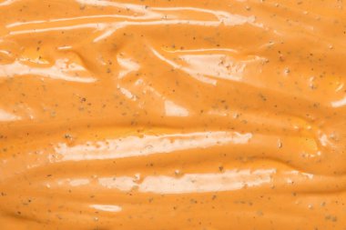 Çırpılmış leziz sos dokusu. Hamburger sosu geçmişi. Üst görünüm. 