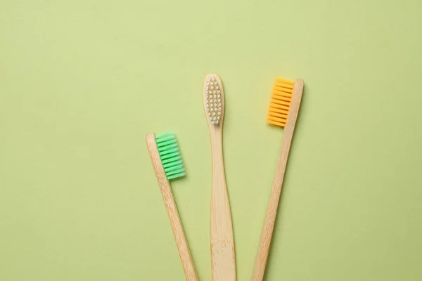 Bamboo Toothbrush Green Background Top View — Stock Photo, Image