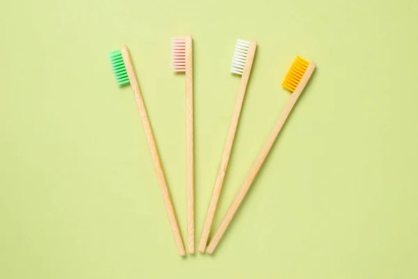 Bamboo Toothbrush Green Background Top View — Stock Photo, Image