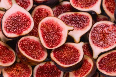 Lezzetli incir arka planı. Üst Manzara. Dilimler.  