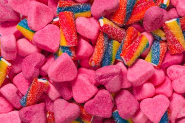 Lezzetli jelibon şekerler. Üst Manzara. Pembe jöleli şeker arka planı. 