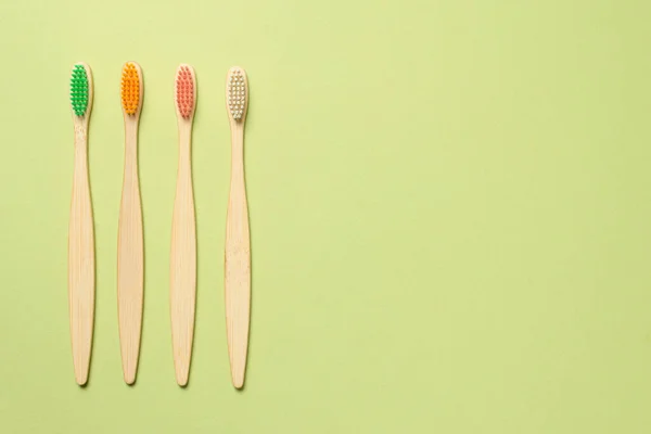 Bamboo Toothbrush Green Background Top View — Stock Photo, Image