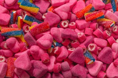 Lezzetli jelibon şekerler. Üst Manzara. Pembe jöleli şeker arka planı. 