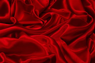 Zengin ve lüks kırmızı ipek kumaş dokusu. Üst görünüm.