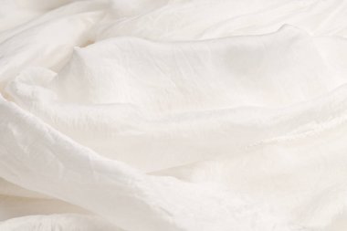 Yumuşak beyaz ipek kumaş arka plan. Kumaş dokusu. 