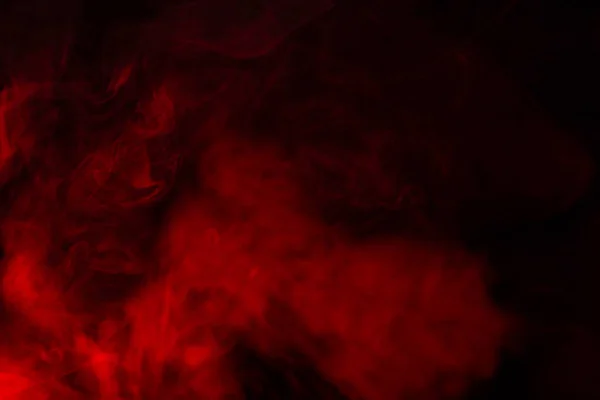 Siyah arka planda kırmızı buhar. Boşluğu kopyala.