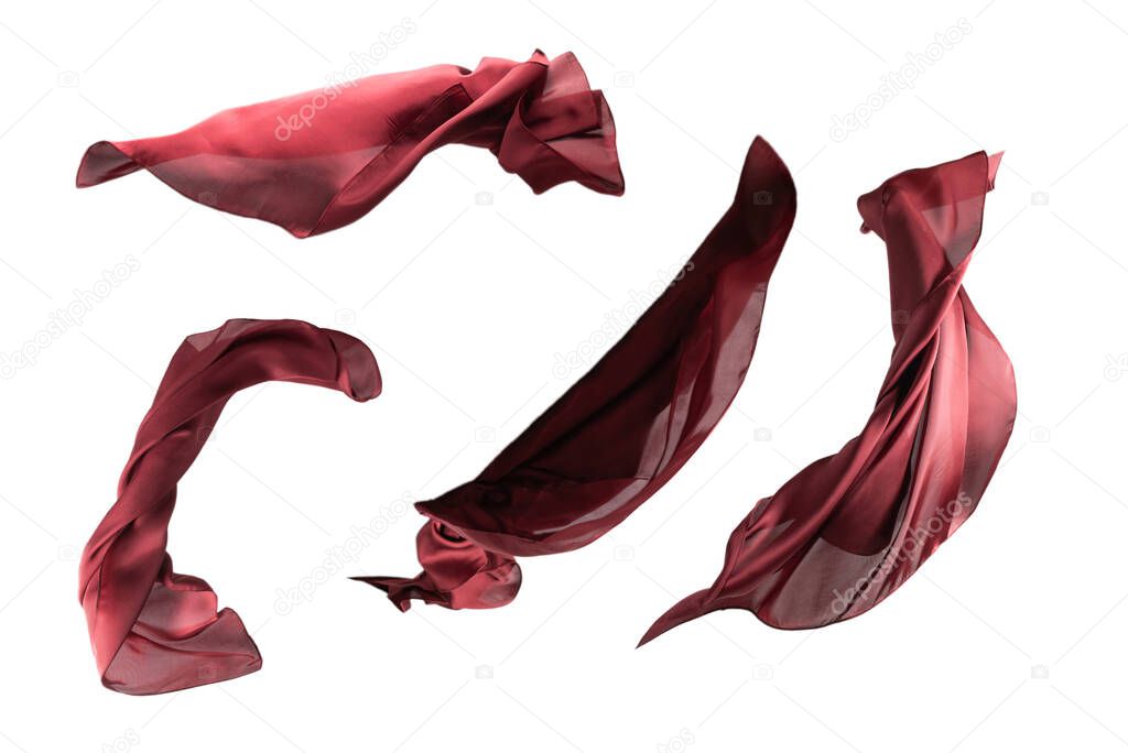Flowing red silk scarf isolated on white background. 