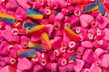 Lezzetli jelibon şekerler. Üst Manzara. Pembe jöleli şeker arka planı. 