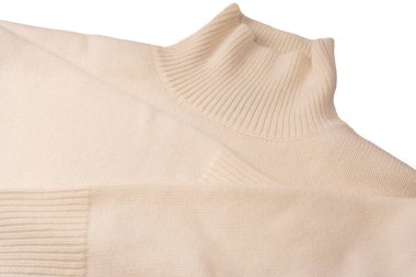 Beyaz arka planda yumuşak sütlü merino yün süveter. Üst görünüm.