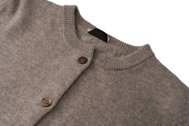 Arka plan olarak gri hırka dokusu. Örgü desenli. Üst görünüm. 