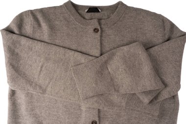 Arka plan olarak gri hırka dokusu. Örgü desenli. Üst görünüm. 