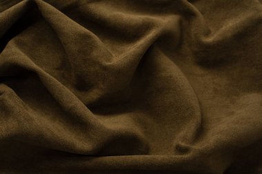 Arka plan olarak yeşil kumaş dokusu. Üst görünüm. 