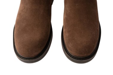 Kahverengi deri çizmeler beyaz arka planda izole edilmiş.. 