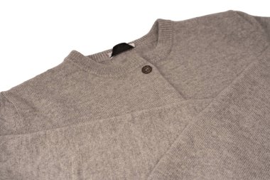 Arka plan olarak gri hırka dokusu. Örgü desenli. Üst görünüm. 