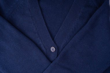 Arka plan olarak lacivert merino yün hırka dokusu. Üst görünüm. 