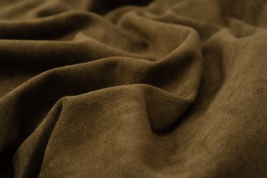 Arka plan olarak yeşil kumaş dokusu. Üst görünüm. 