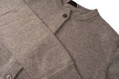 Arka plan olarak gri hırka dokusu. Örgü desenli. Üst görünüm. 