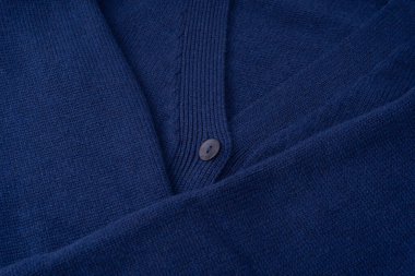 Arka plan olarak lacivert merino yün hırka dokusu. Üst görünüm. 