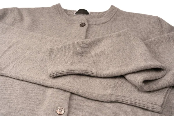 Arka plan olarak gri hırka dokusu. Örgü desenli. Üst görünüm. 